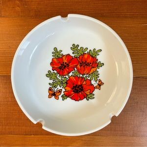 Vintage porcelain ashtray with floral pattern